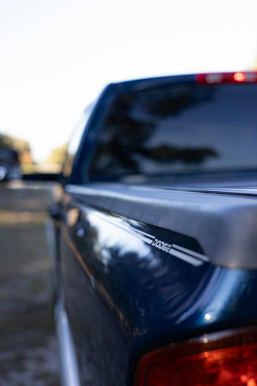 Close-up of the rear of a dark blue pickup truck
